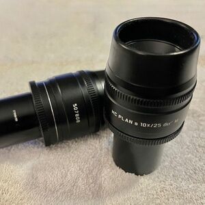 Pair, Leica HC Plan s 10x25 M Eyepieces.